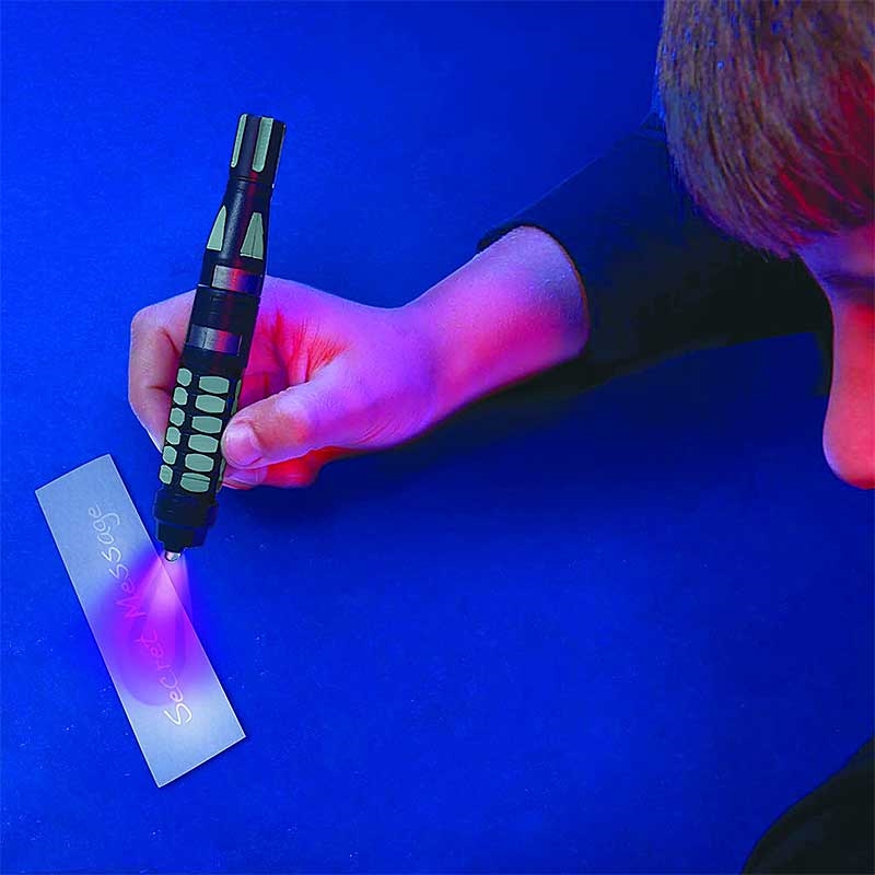 SpyX Micro Gear Set - Boy using Invisible Pen