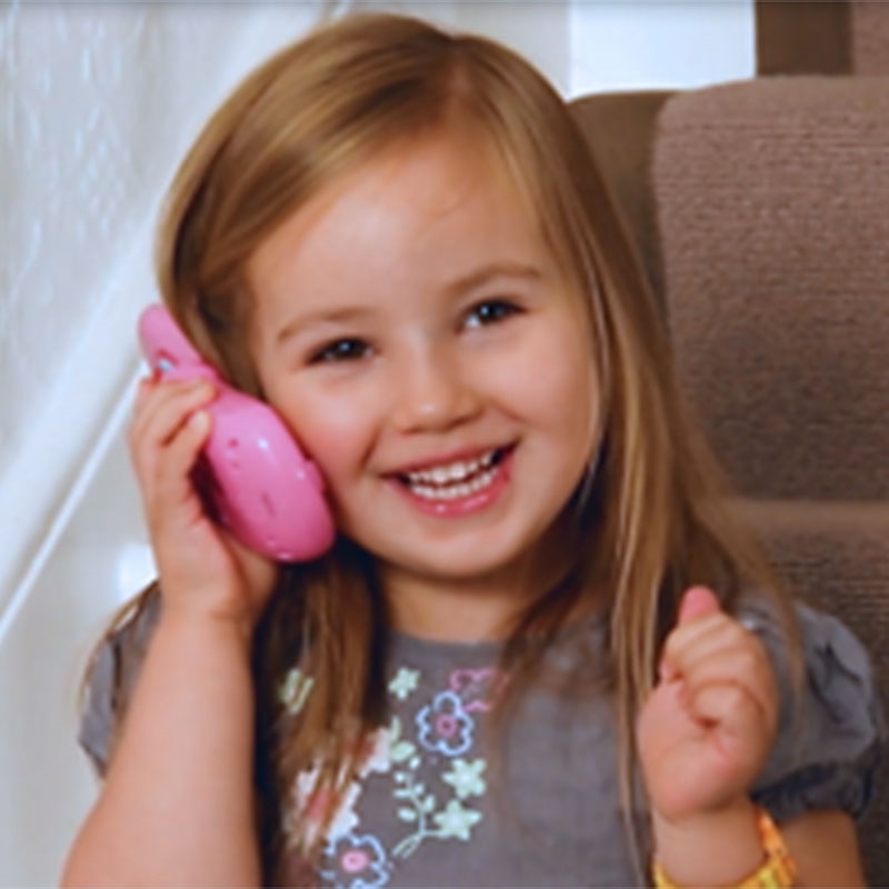Peppa's Flip and Learn Phone - Young Girl having fun