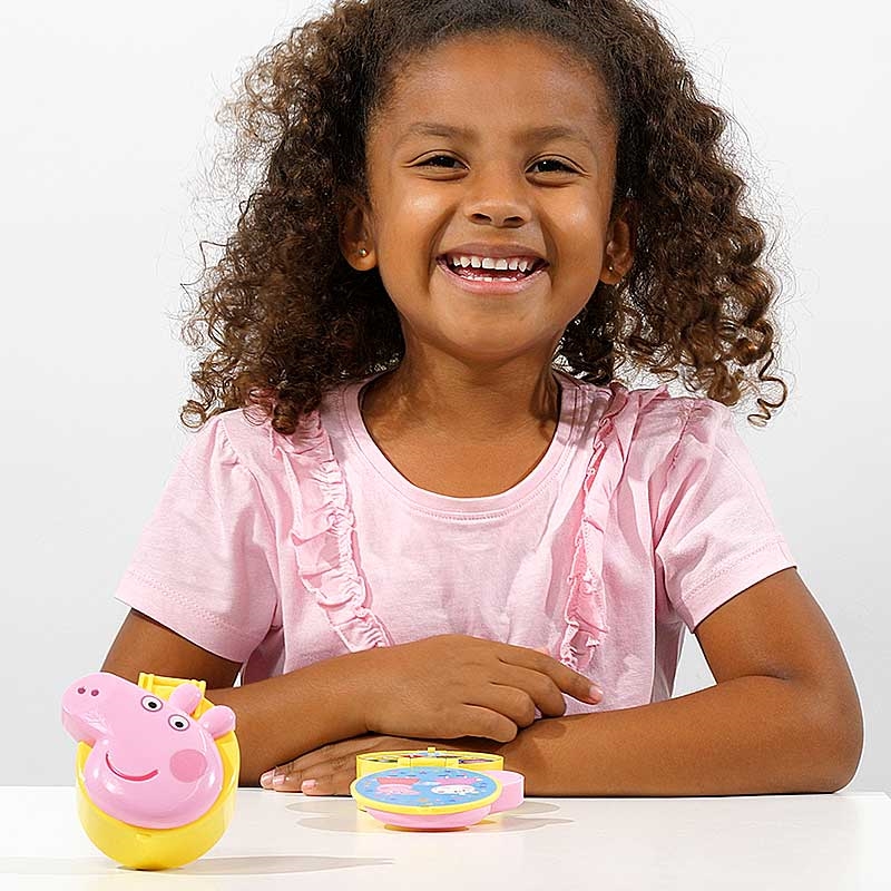 Peppa's Flip Up Learning Pad - Young Girl Having Fun with Product
