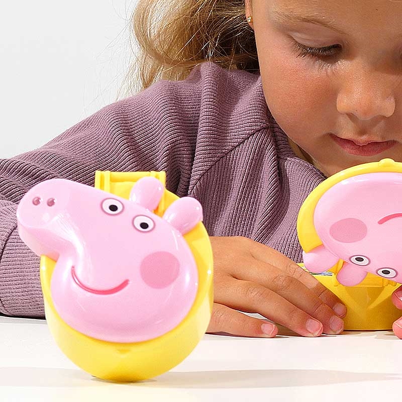 Peppa's Flip Up Learning Pad - Young Girl Engaged with Product