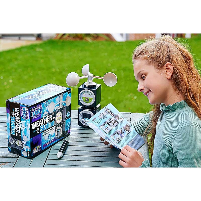 Science Mad 5-in-1 Weather Station - Girl reading Instructions
